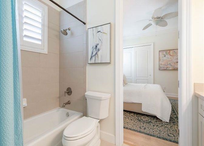 503 Cinnamon Beach Lane Palm Coast, FL 32137 - Photo 13 of 50 a bathroom with a toilet and a shower