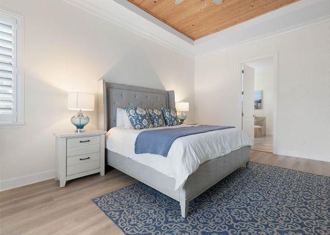 503 Cinnamon Beach Lane Palm Coast, FL 32137 - Photo 18 of 50 a bedroom with a white bed and white walls
