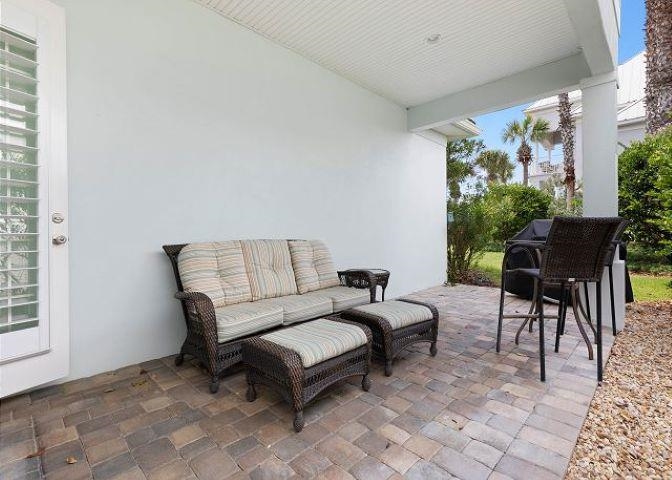 503 Cinnamon Beach Lane Palm Coast, FL 32137 - Photo 22 of 50 a living room with furniture and a potted plant