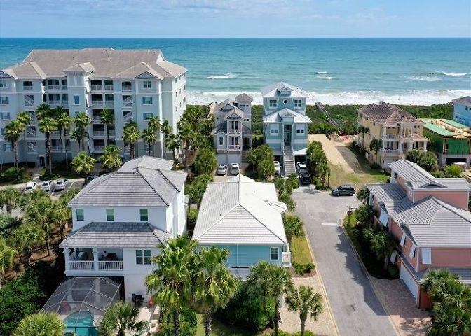 503 Cinnamon Beach Lane Palm Coast, FL 32137 - Photo 3 of 50 an aerial view of multiple houses with yard