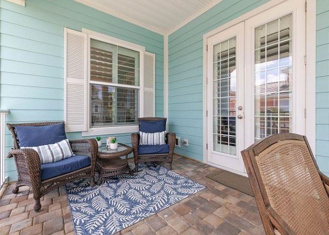 503 Cinnamon Beach Lane Palm Coast, FL 32137 - Photo 35 of 50 a living room with furniture and windows