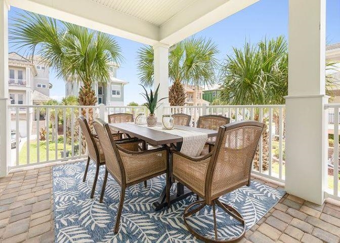 503 Cinnamon Beach Lane Palm Coast, FL 32137 - Photo 40 of 50 a view of a house with backyard and sitting area