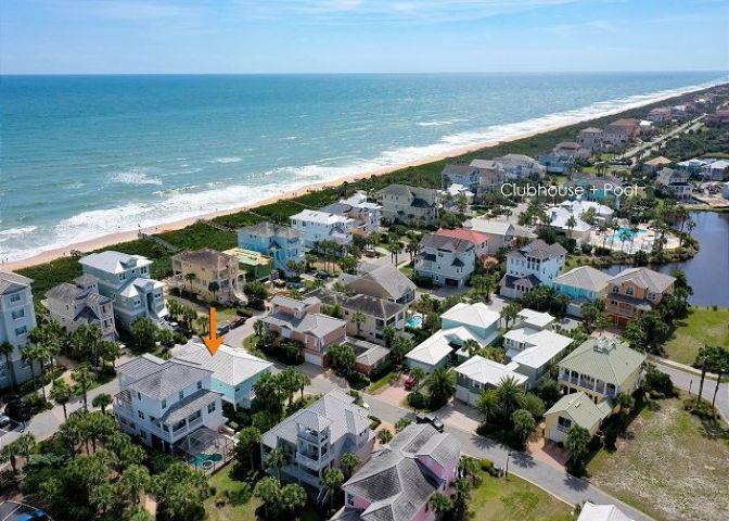 503 Cinnamon Beach Lane Palm Coast, FL 32137 - Photo 47 of 50 an aerial view of ocean and residential houses with outdoor space
