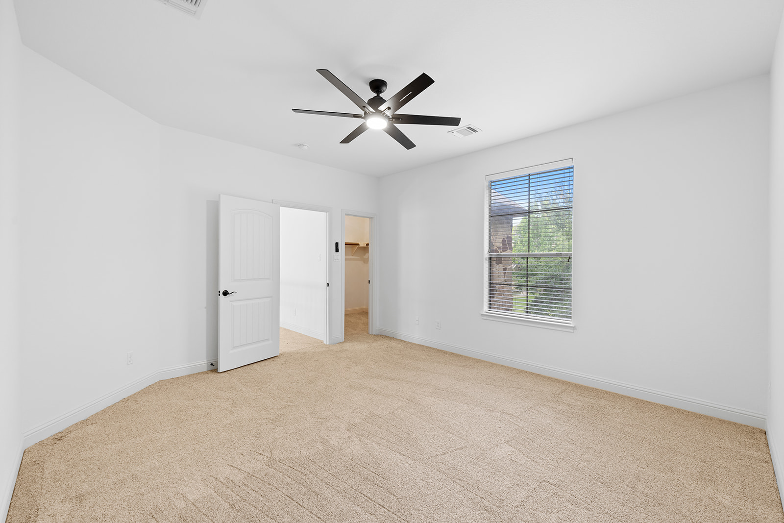 114 North Saddle Ridge Drive Cedar Park, TX 78613 - Photo 31 of 40 a view of a livingroom with a ceiling fan and window