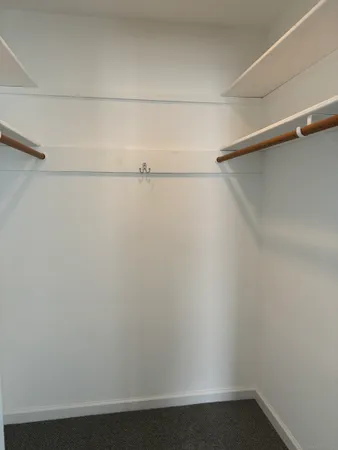 a view of small space with racks on the wall