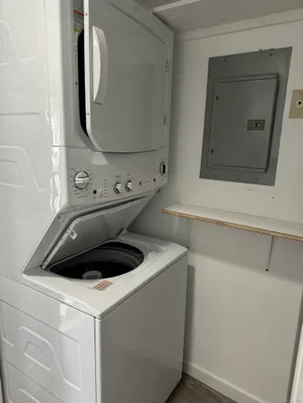 a utility room with dryer and washer