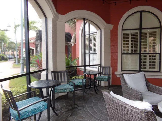 a bedroom with bed and wooden floor