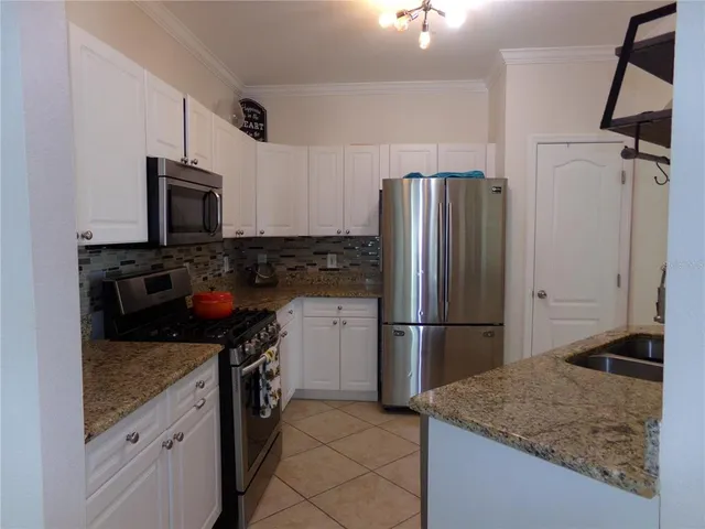 a living room with a fireplace and a fireplace