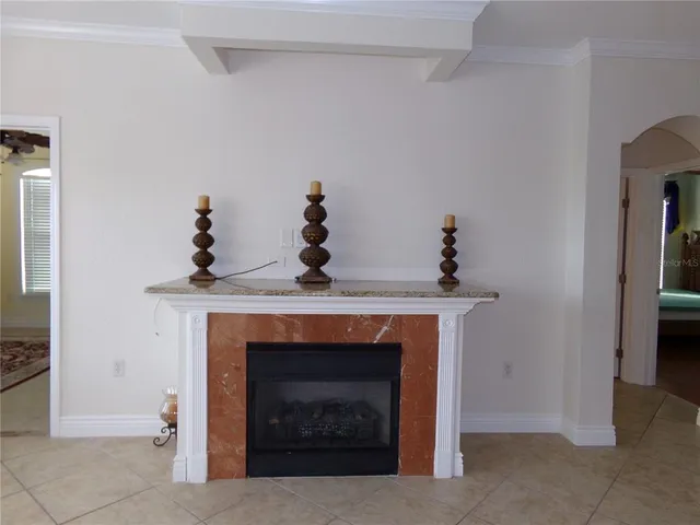 a kitchen with a refrigerator stove and microwave