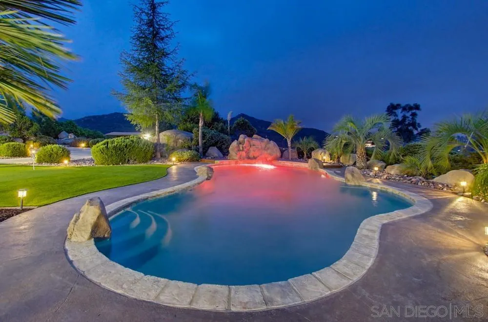 3725 Via Cielo Azul Alpine, CA 91901 - Photo 14 of 43 a view of a swimming pool in the backyard of a house