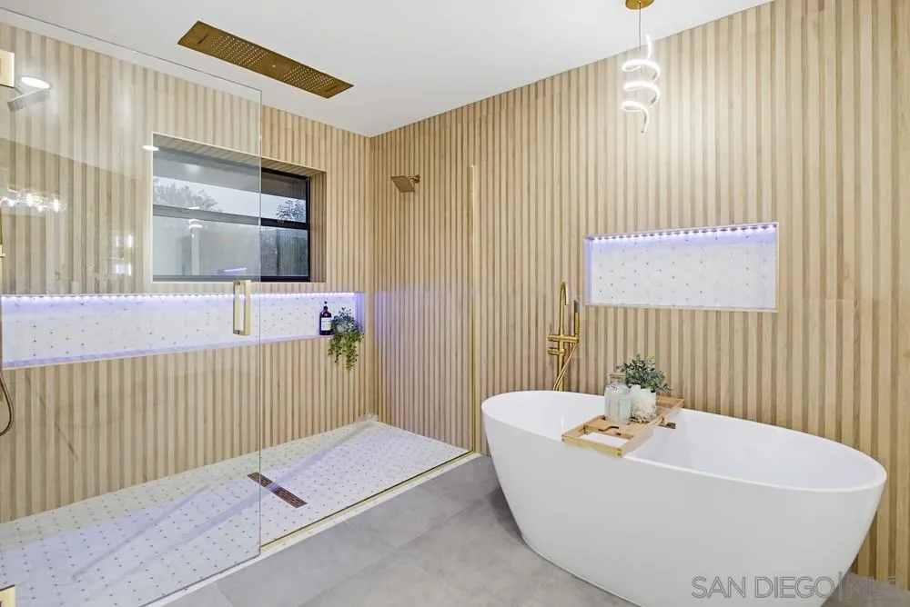 3725 Via Cielo Azul Alpine, CA 91901 - Photo 27 of 43 a bathroom with a bathtub and shower
