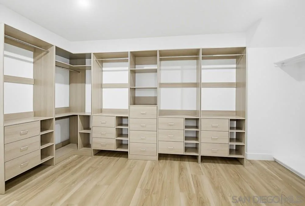 3725 Via Cielo Azul Alpine, CA 91901 - Photo 29 of 43 a view of an empty room with cabinet and windows
