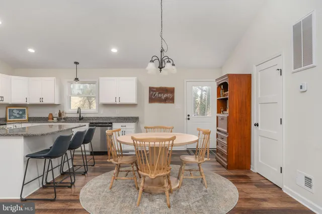 a view of a dining room with furniture