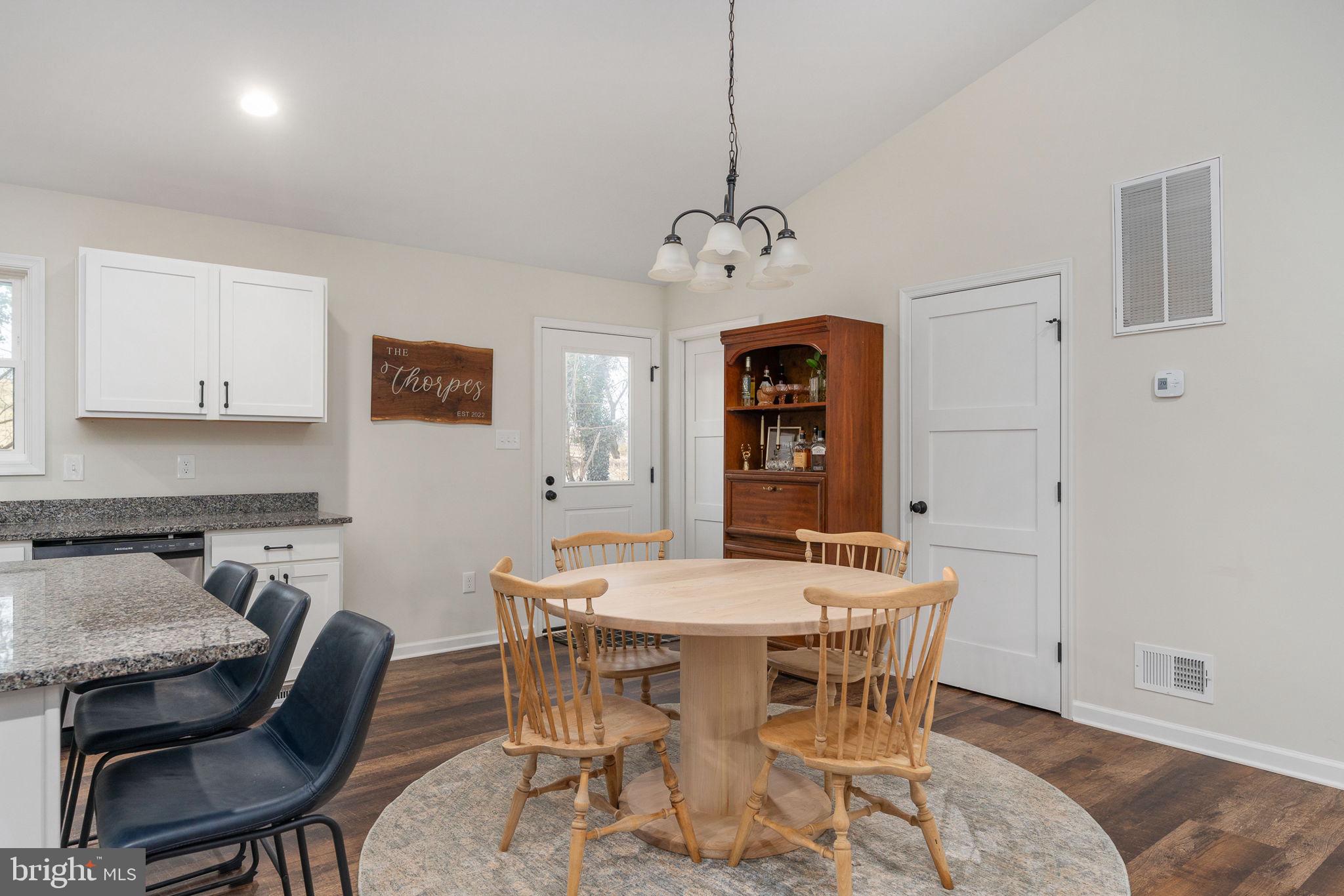 158 Red Hill Road Orange, VA 22960 - Photo 19 of 54 a view of a dining room with furniture window and wooden floor