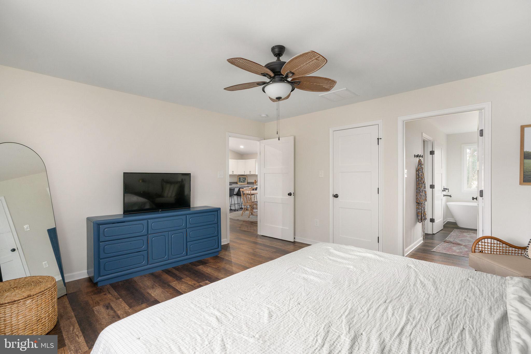 158 Red Hill Road Orange, VA 22960 - Photo 26 of 54 a bedroom with a bed and a flat screen tv
