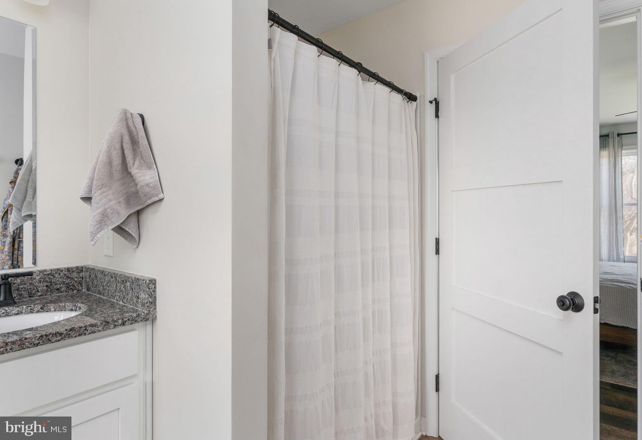158 Red Hill Road Orange, VA 22960 - Photo 32 of 54 a bathroom with a granite countertop sink and a mirror