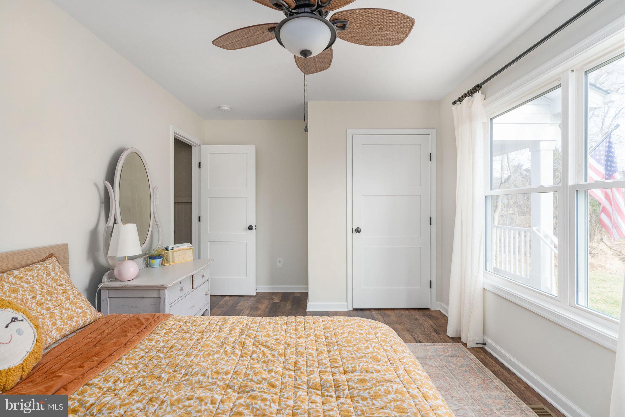 158 Red Hill Road Orange, VA 22960 - Photo 43 of 54 a bedroom with a bed and dresser with mirror