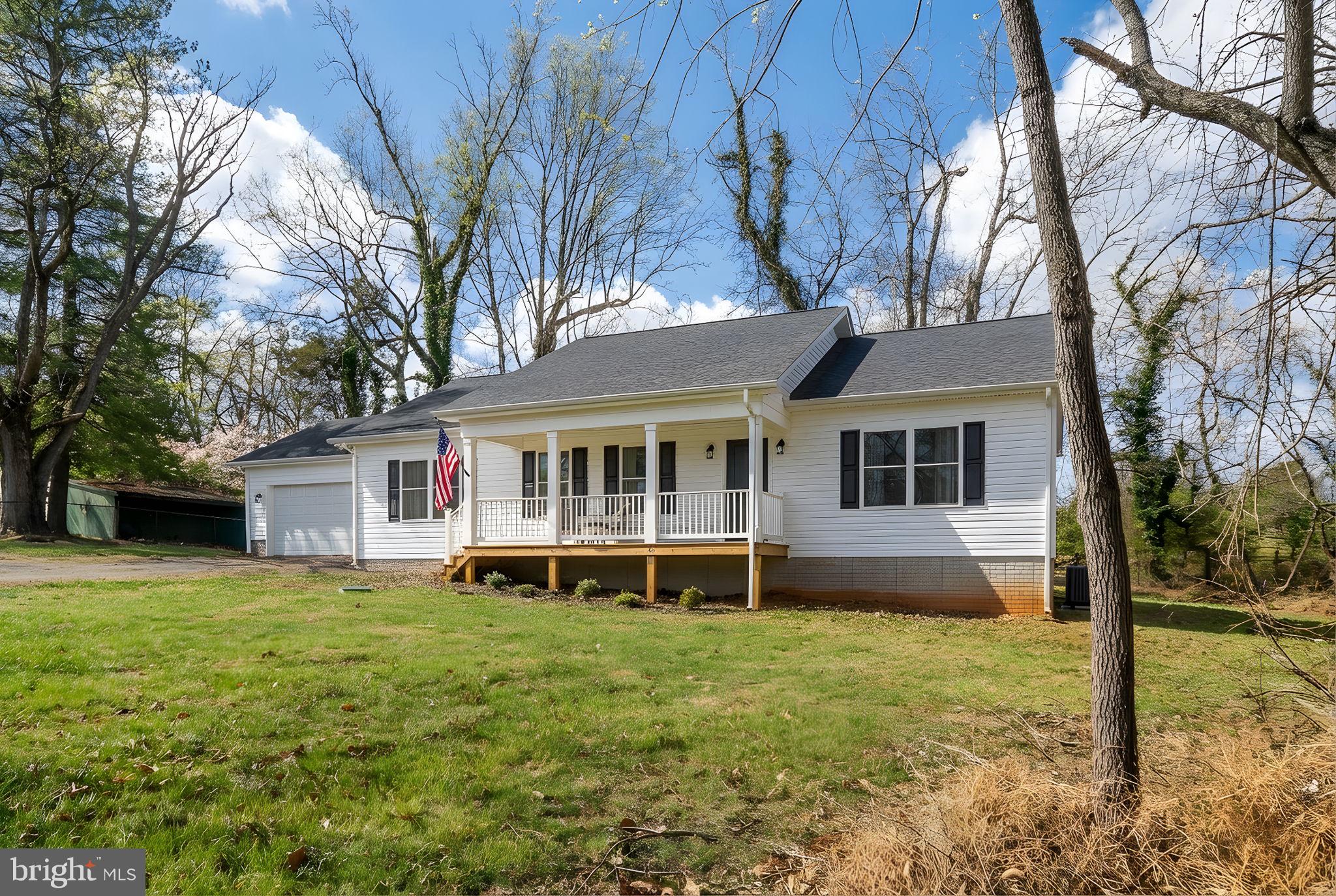 158 Red Hill Road Orange, VA 22960 - Photo 54 of 54 a view of a house with a yard and a large tree