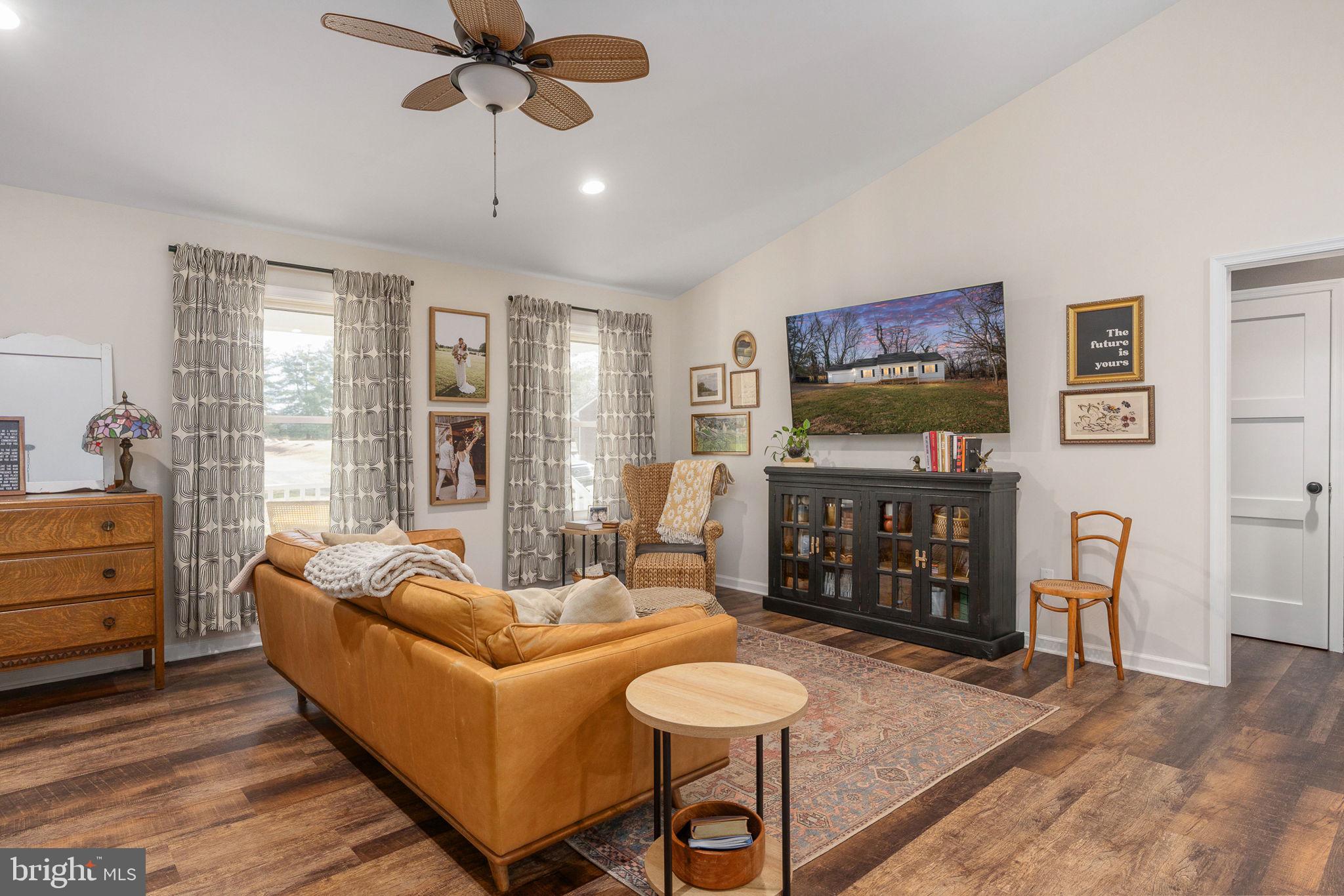 158 Red Hill Road Orange, VA 22960 - Photo 9 of 54 a living room with furniture and a flat screen tv