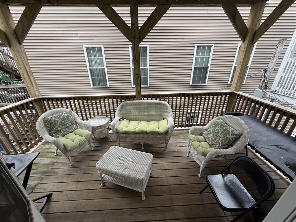 190 L Street, Unit 2 Boston, MA 02127 - Photo 15 of 15 a view of a deck with chair and a table