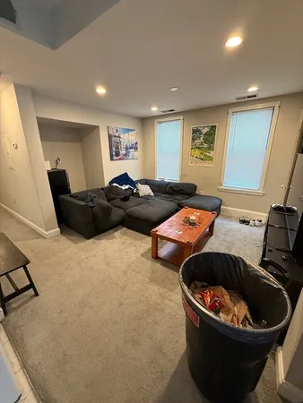 a living room with furniture and a couch