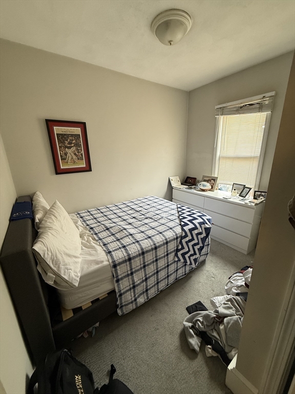 190 L Street, Unit 2 Boston, MA 02127 - Photo 5 of 15 a bedroom with a bed and a window