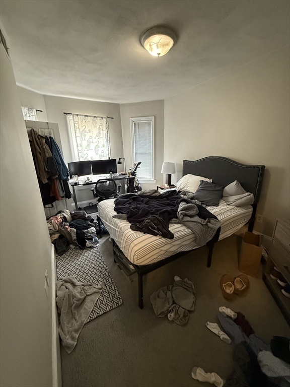 190 L Street, Unit 2 Boston, MA 02127 - Photo 7 of 15 a living room with furniture and a window