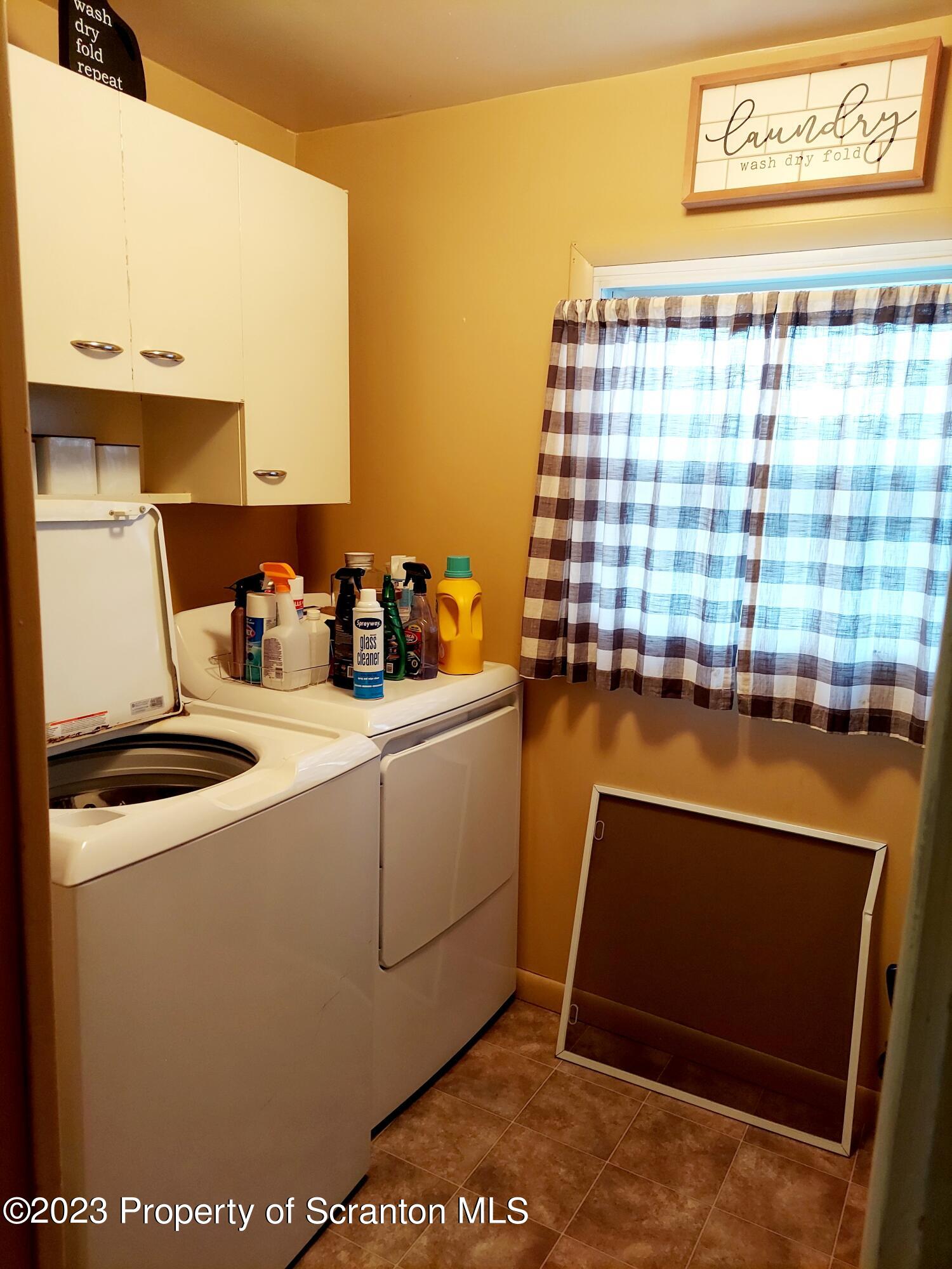 214 Cherry Street Dunmore, PA 18512 - Photo 15 of 58 a room with storage and utility