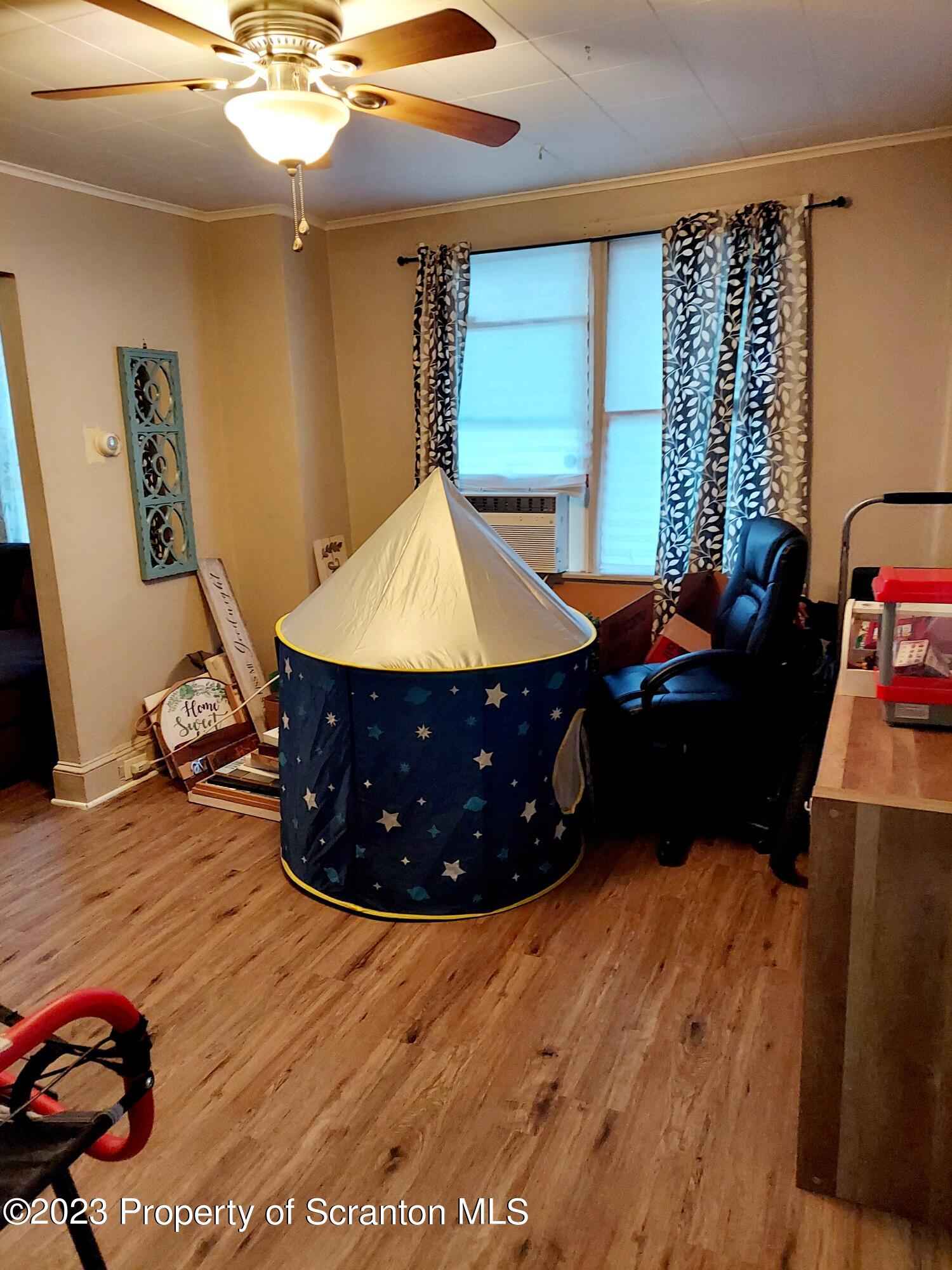 214 Cherry Street Dunmore, PA 18512 - Photo 17 of 58 a bed room with a bed and a window