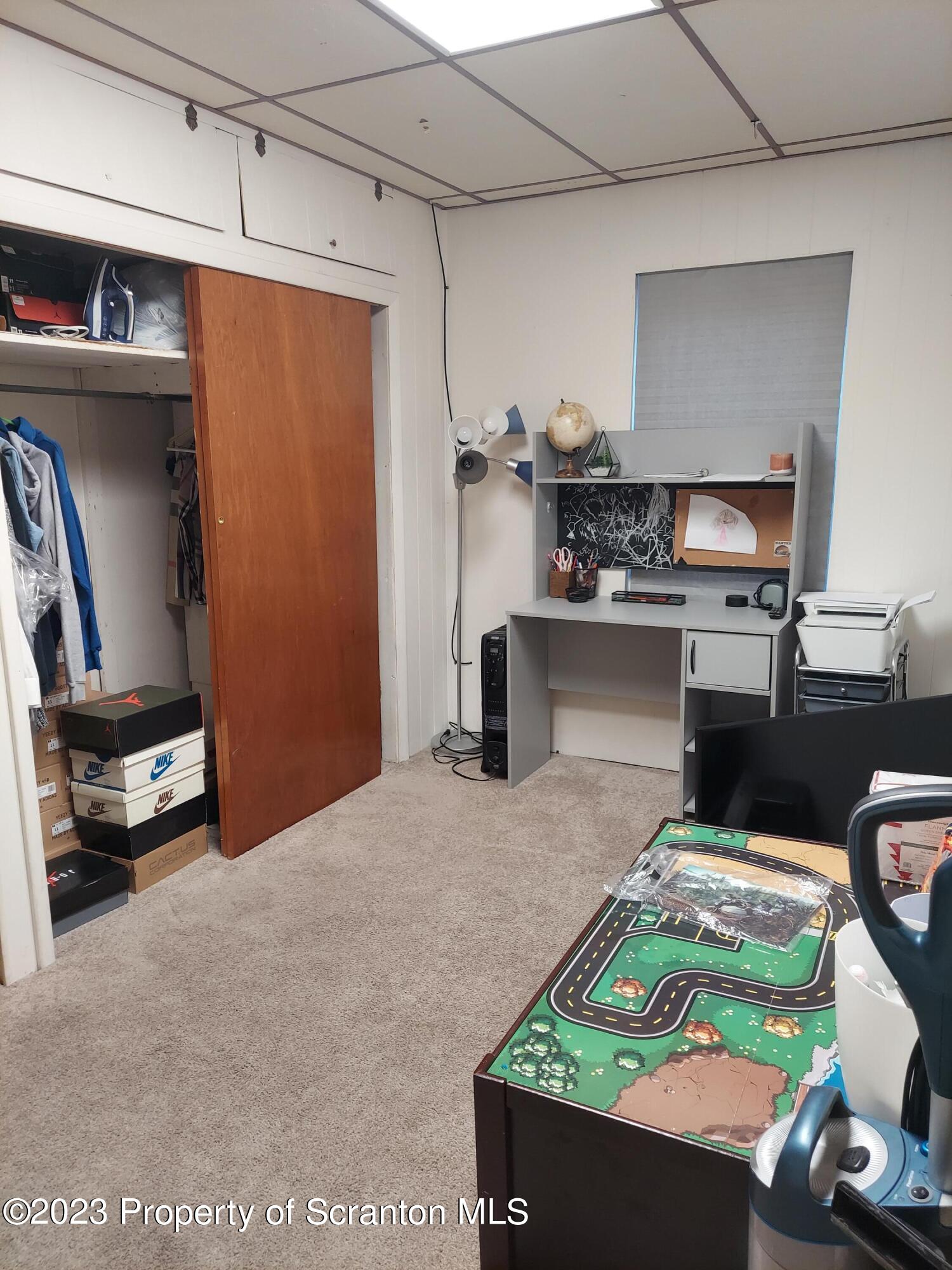 214 Cherry Street Dunmore, PA 18512 - Photo 24 of 58 a room with window and furniture