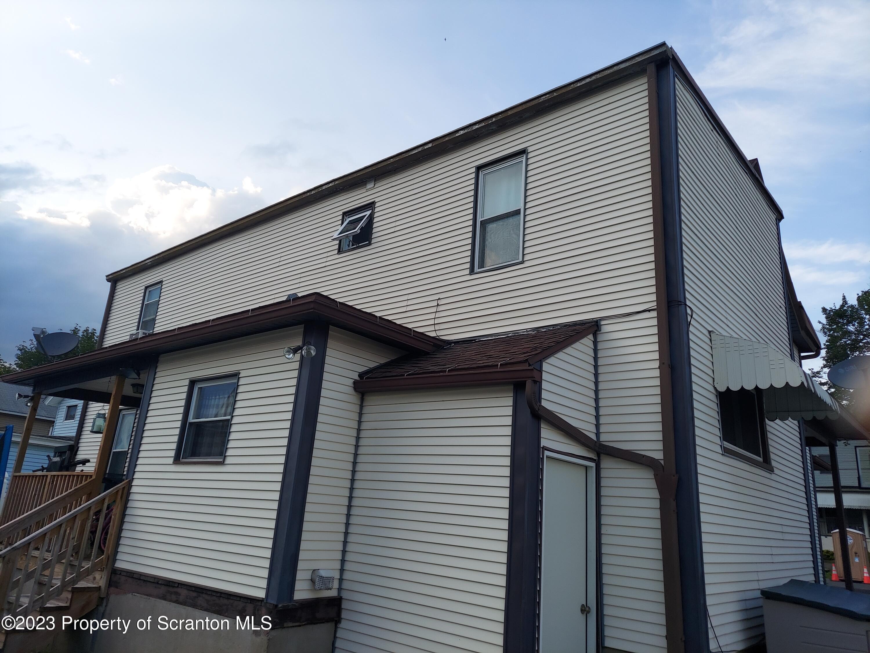 214 Cherry Street Dunmore, PA 18512 - Photo 8 of 58 a front view of a house
