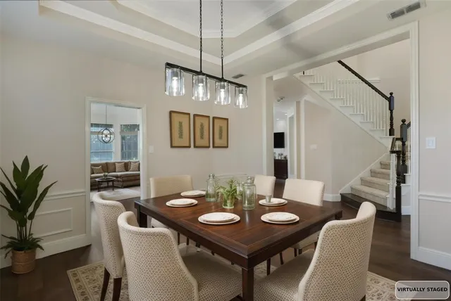 a view of an empty room with window and fire place