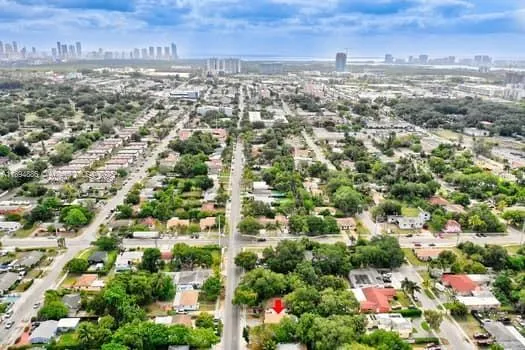 an aerial view of residential building with parking space