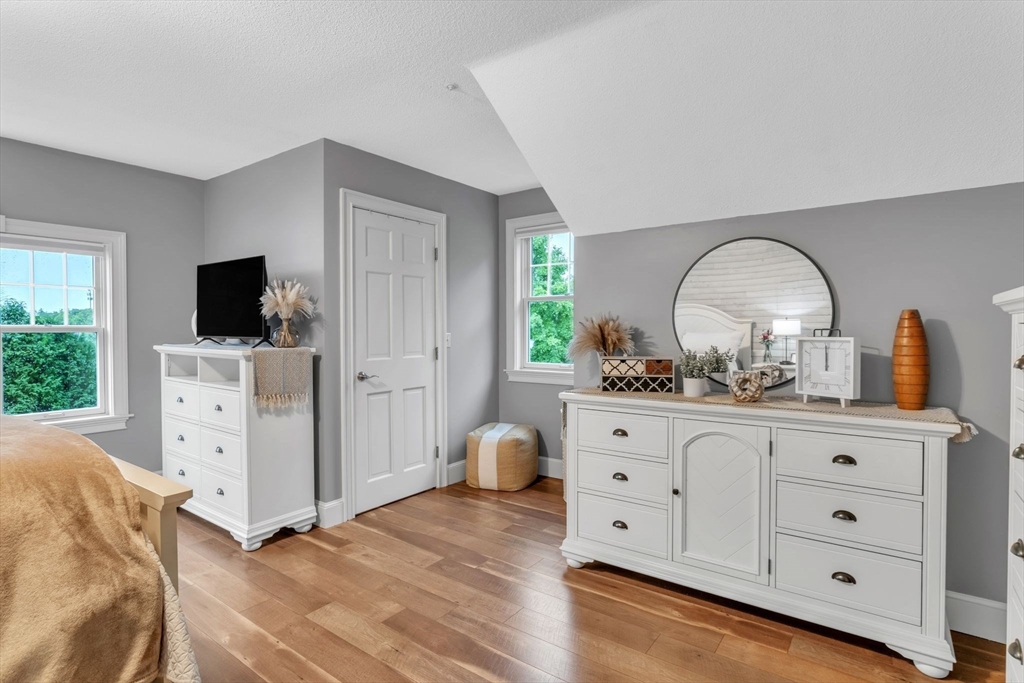 11 Echo Hill Road Wilbraham, MA 01095 - Photo 28 of 42 a living room with furniture and flat screen tv