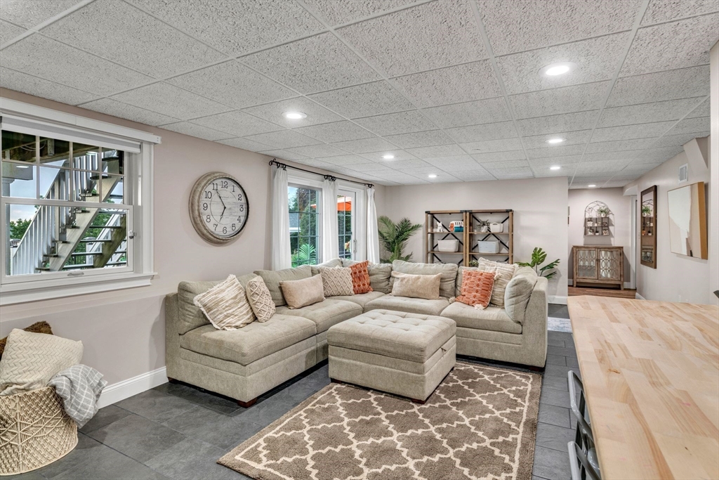 11 Echo Hill Road Wilbraham, MA 01095 - Photo 33 of 42 a living room with furniture and a large window
