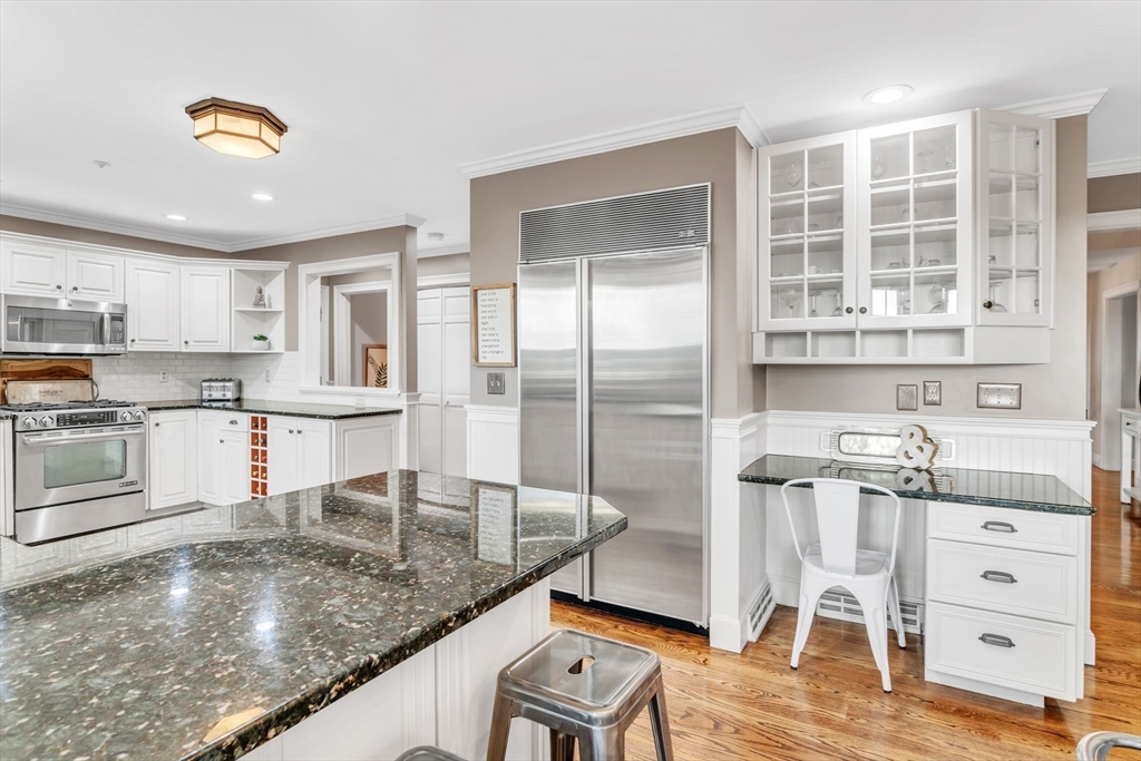 11 Echo Hill Road Wilbraham, MA 01095 - Photo 4 of 42 a kitchen with stainless steel appliances granite countertop a stove and a sink