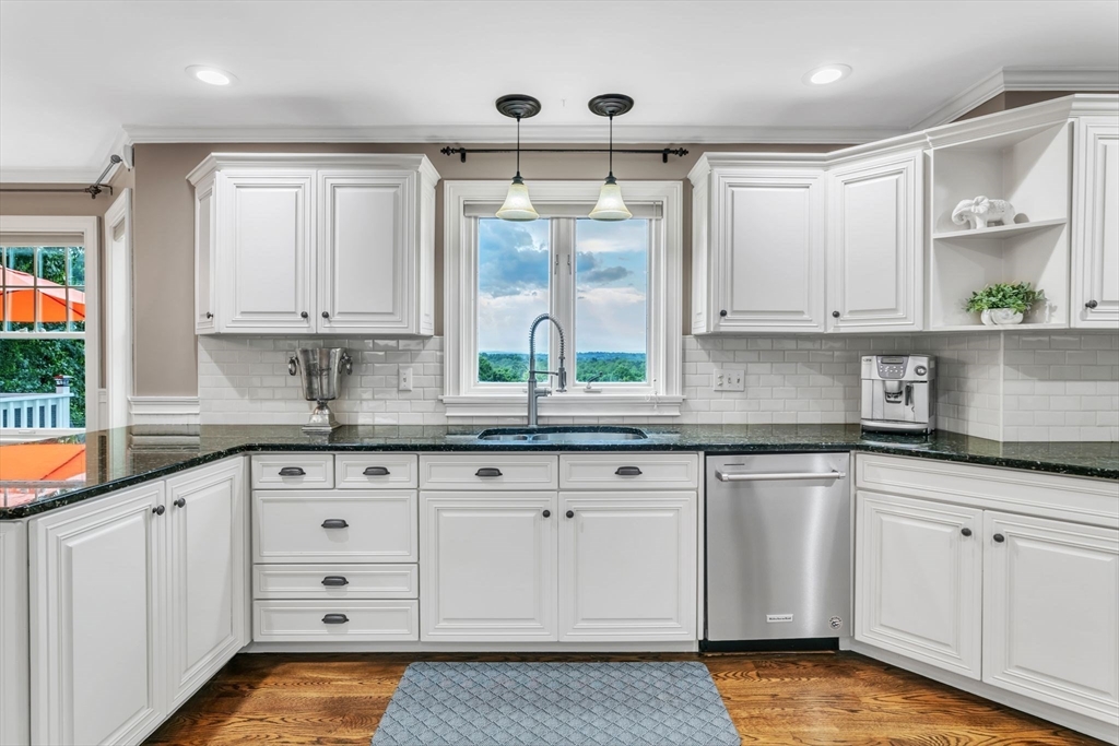11 Echo Hill Road Wilbraham, MA 01095 - Photo 5 of 42 a kitchen with granite countertop white cabinets and white appliances