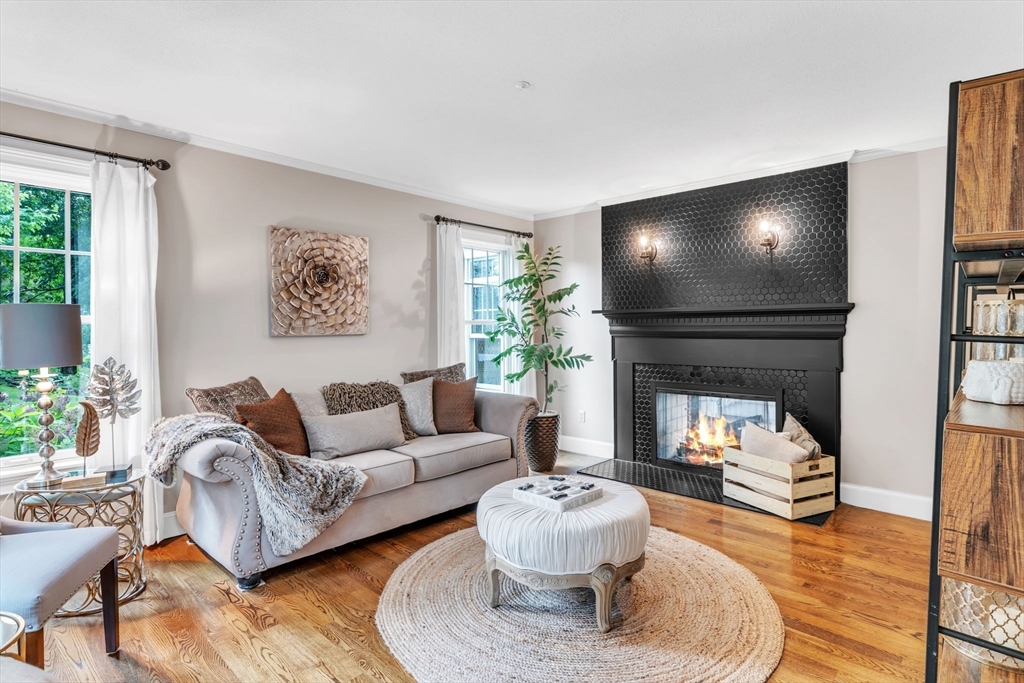 11 Echo Hill Road Wilbraham, MA 01095 - Photo 9 of 42 a living room with furniture and a flat screen tv