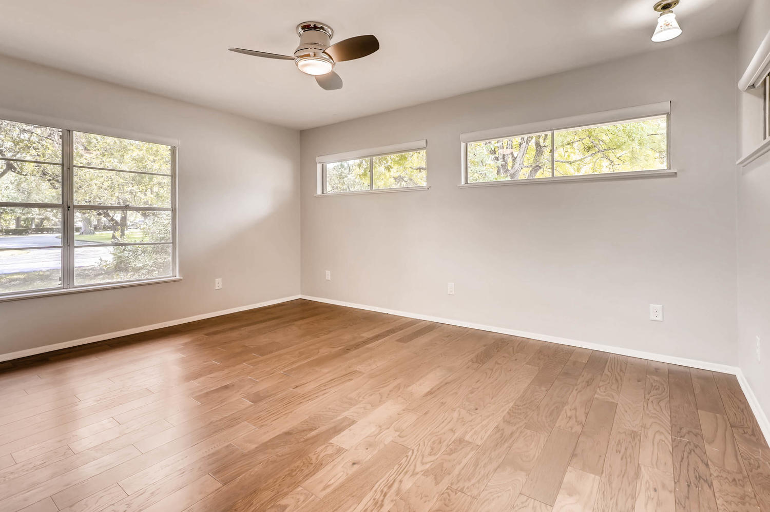 446 Pike Road San Antonio, TX 78209 - Photo 16 of 28 Hardwood floors and generous natural light create an inviting atmosphere.