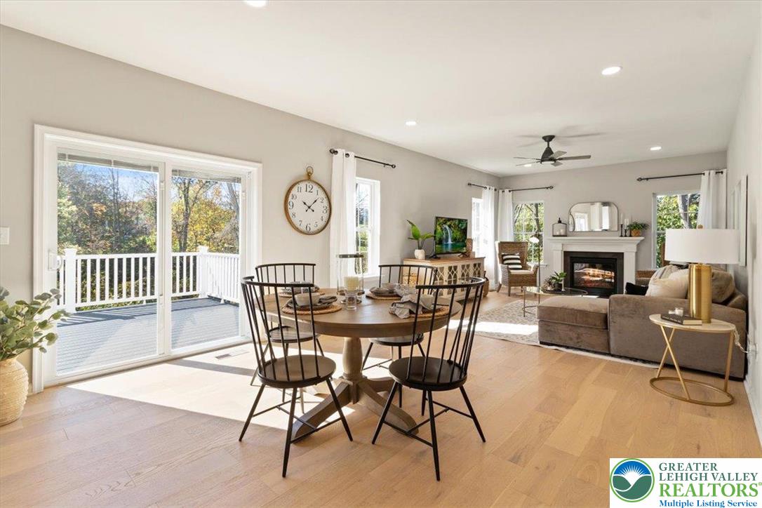 77 Tumble Creek Road, Unit 14 Easton, PA 18042 - Photo 14 of 32 a view of a dining room with furniture window and wooden floor