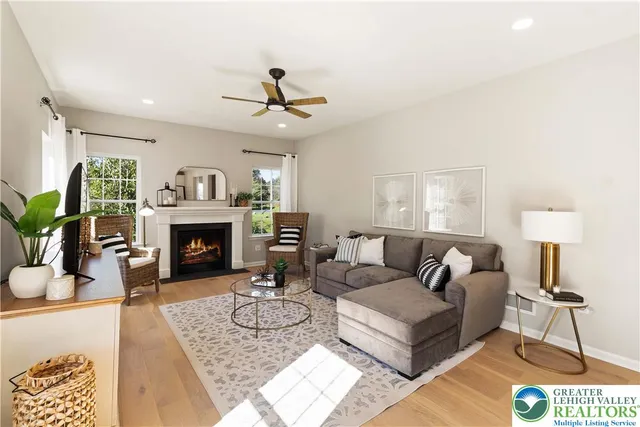 a living room with furniture or couch and a flat screen tv