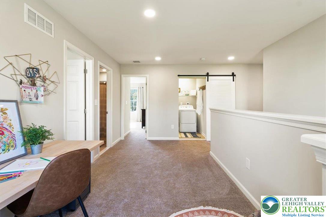 77 Tumble Creek Road, Unit 14 Easton, PA 18042 - Photo 19 of 32 a view of livingroom with furniture and wooden floor