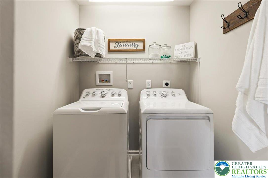 77 Tumble Creek Road, Unit 14 Easton, PA 18042 - Photo 31 of 32 a utility room with dryer and washer
