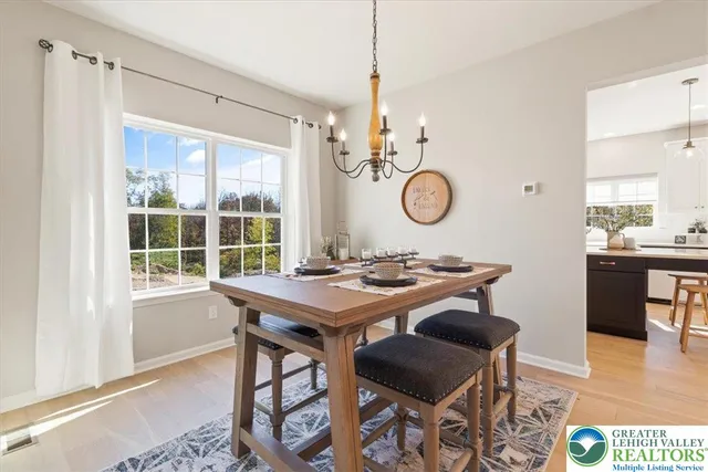 a view of a table and chairs in a room