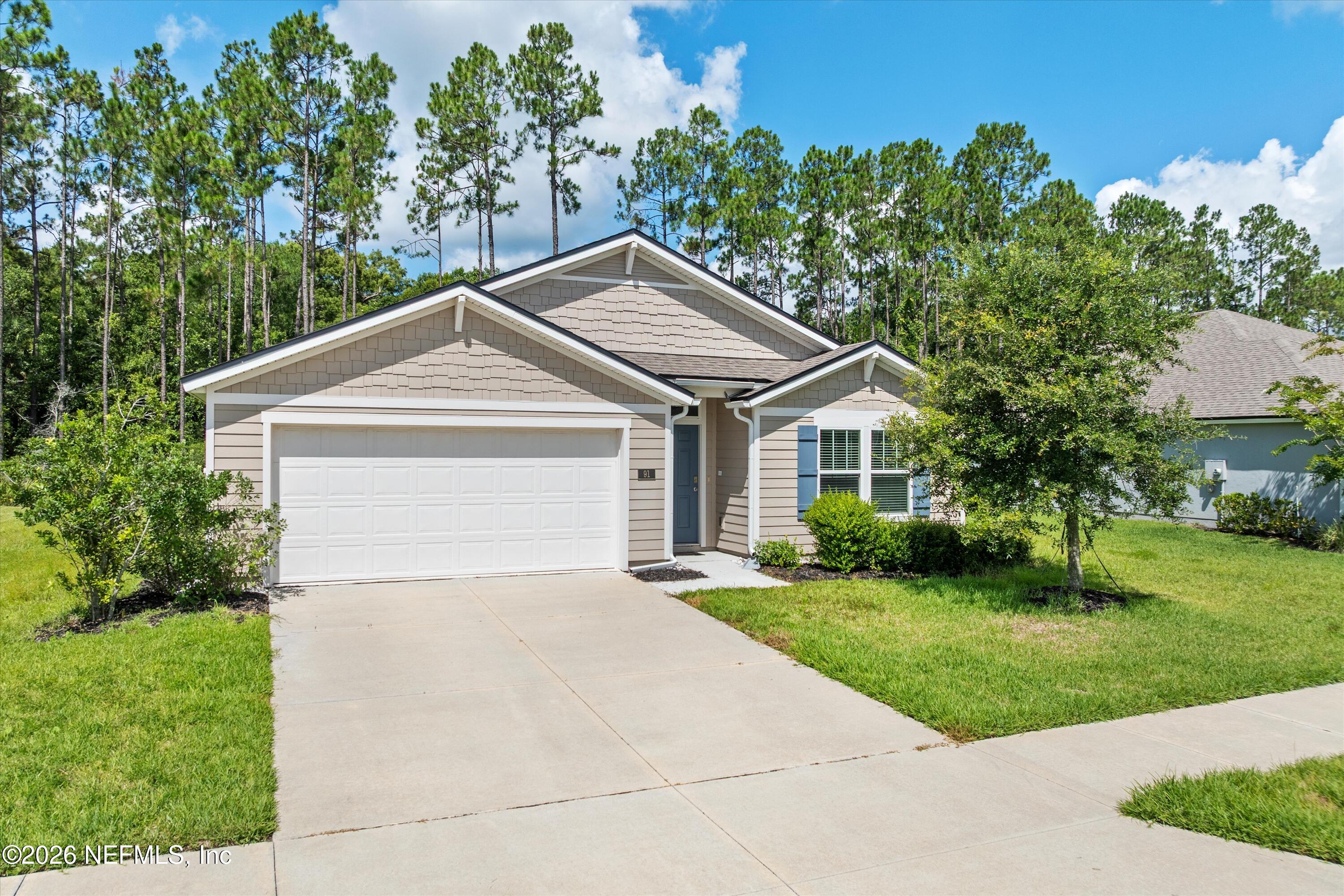 91 Rivertown Road Palm Coast, FL 32137 - Photo 1 of 36 02-Front