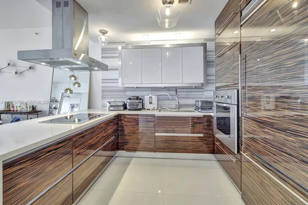 a view of kitchen with counter top space