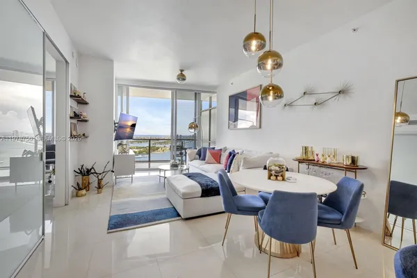 a living room with furniture and a couch