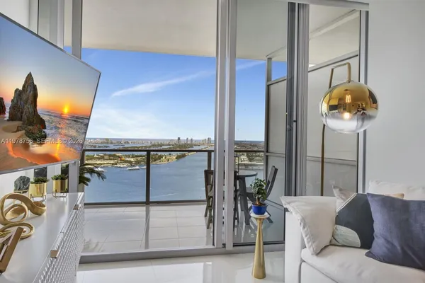 a view of balcony with furniture