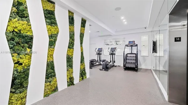 a view of a room with gym equipment