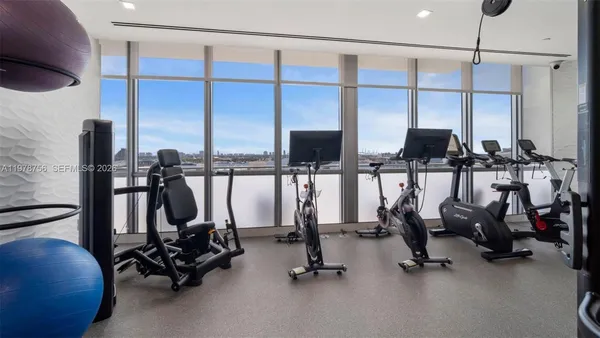 a view of a room with gym equipment